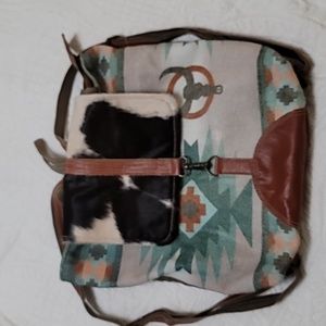 Southwestern saddle blanket, cowhide backpack purse